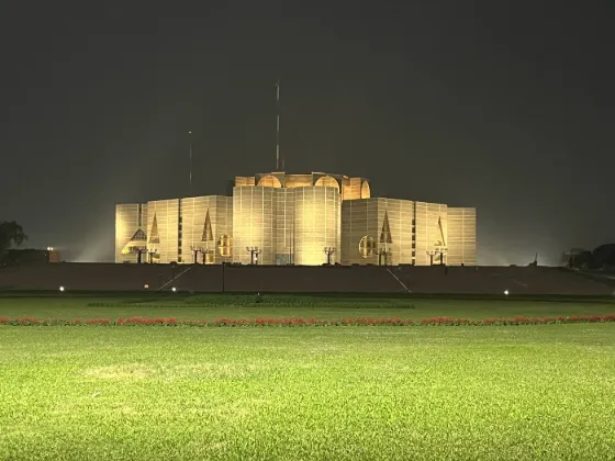 The National Parliament House (Jatiya Sangsad Bhaban) in Dhaka, Bangladesh, lit up at night