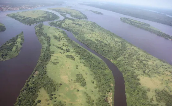 The broad Congo River seen from the air, braided around long green forested islands near Kisangani
