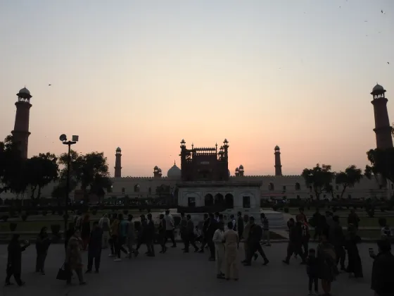 The Badshahi Mosque in Lahore, Pakistan, silhouetted at dusk