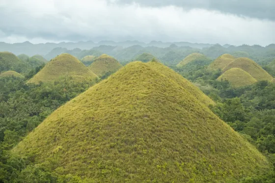 The grass-covered conical mounds of the Chocolate Hills on Bohol island, Philippines
