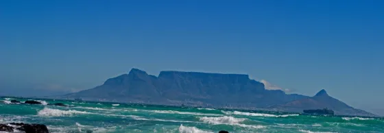 Table Mountain seen across the ocean from Bloubergstrand, Cape Town, South Africa