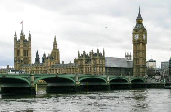 The Houses of Parliament and Elizabeth Tower (Big Ben) in Westminster, London, seen across the River Thames